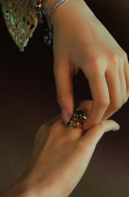 Over the Town . Cluster gemstone ring