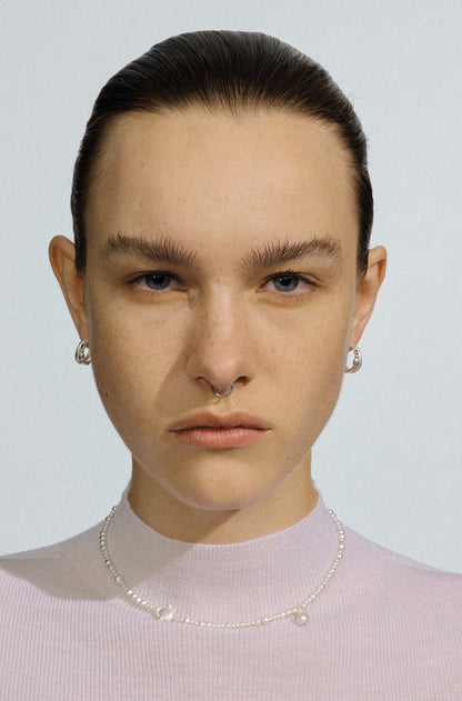 Gone with the Wind . Holding Earring